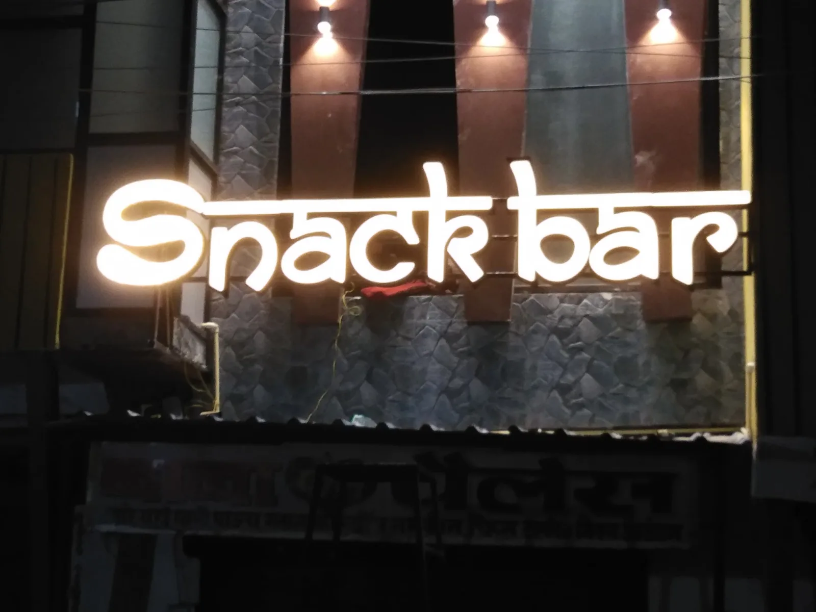Illuminated LED sign board storefront work