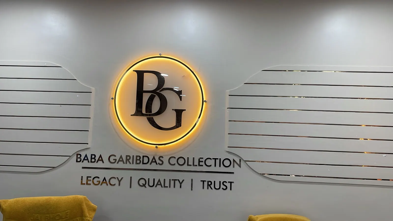 Custom illuminated brand logo wall display